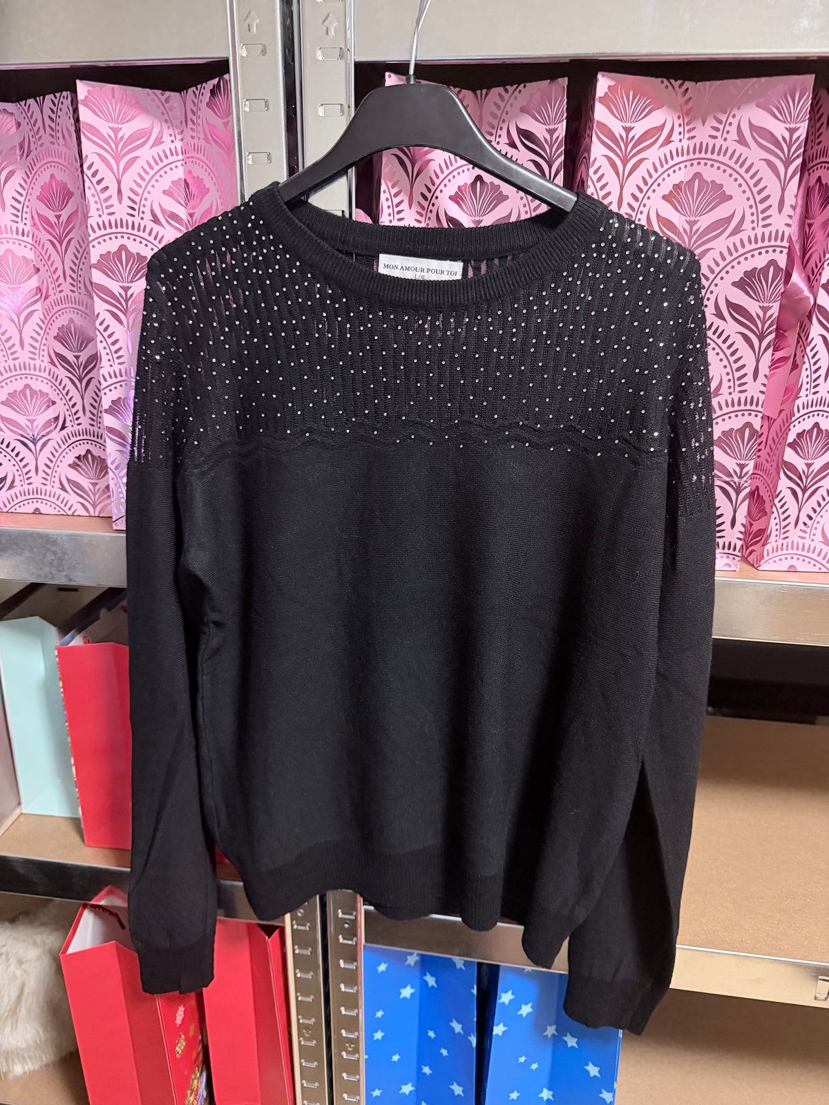 Zwarte glittertrui met mesh bovenkant